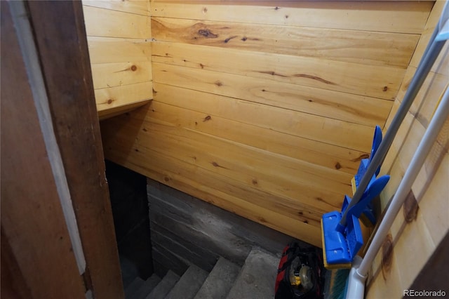 view of sauna featuring wood walls