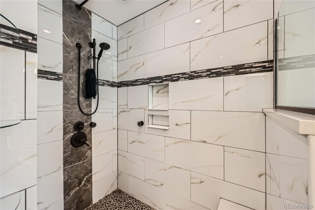 2023 S Rifle St, Aurora, CO 80013 - bathroom with tiled shower