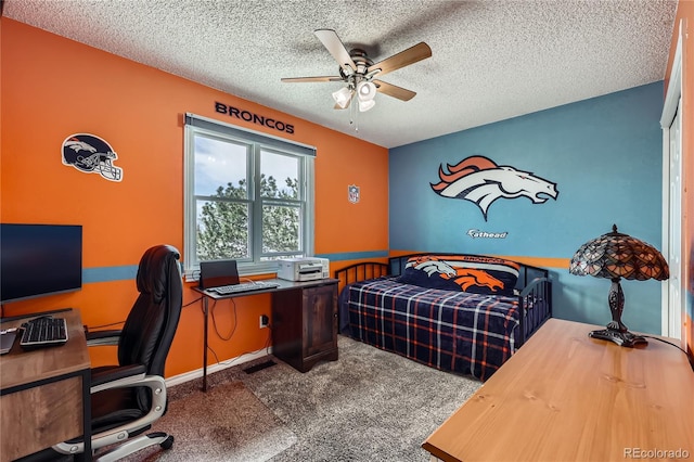 2023 S Rifle St, Aurora, CO 80013 - bedroom with carpet floors, an office area, a textured ceiling, and a ceiling fan