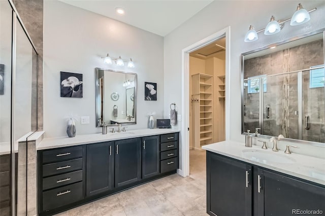 bathroom with vanity and walk in shower