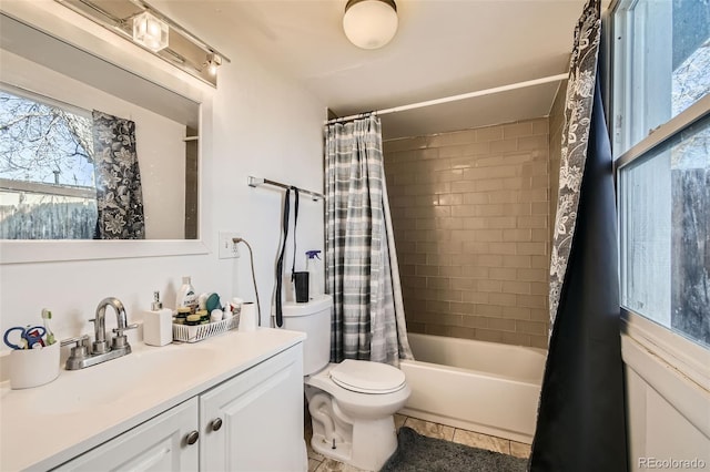 full bathroom featuring toilet, shower / tub combo, tile patterned flooring, and vanity