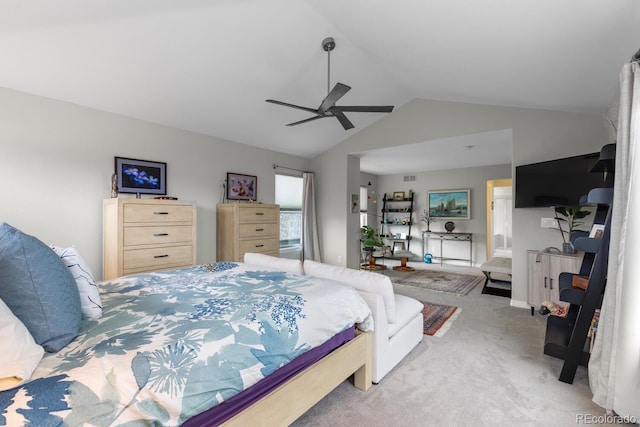 bedroom featuring lofted ceiling, light carpet, and ceiling fan