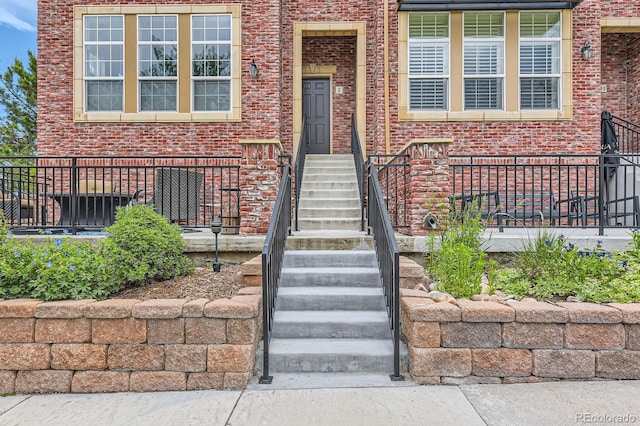 9424 Ridgeline Blvd, Highlands Ranch, CO 80129 - property entrance with brick siding