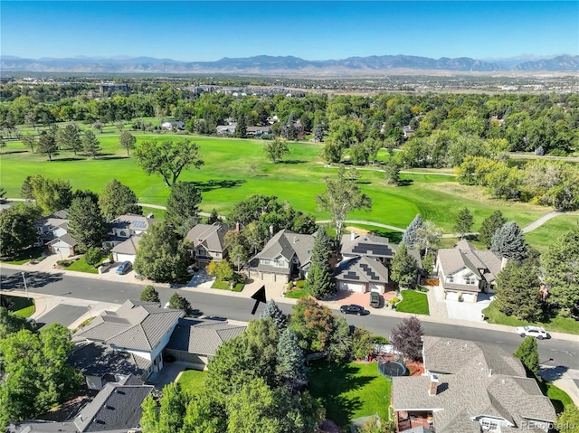 birds eye view of property featuring a mountain view