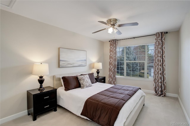 bedroom with light colored carpet and ceiling fan