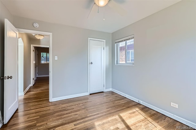 3075 Fairfax St, Denver, CO 80207 - unfurnished bedroom featuring baseboards, a ceiling fan, wood finished floors, and a closet