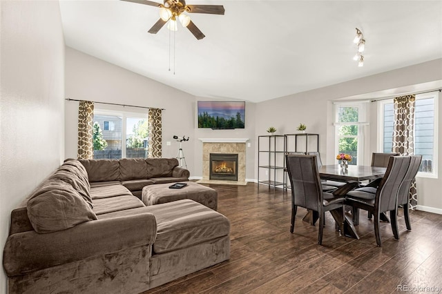878 Candlestar Loop, Fountain, CO 80817 - living room with plenty of natural light, dark wood finished floors, lofted ceiling, and a ceiling fan