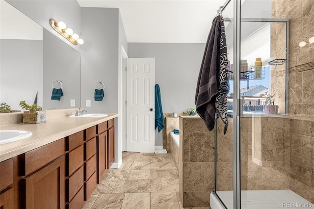 878 Candlestar Loop, Fountain, CO 80817 - full bath featuring a bath, double vanity, tiled shower, and stone finish flooring