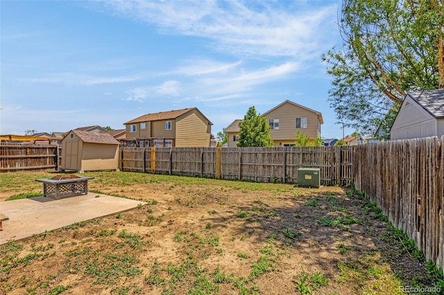 878 Candlestar Loop, Fountain, CO 80817 - fenced backyard with a patio, an outdoor fire pit, and a residential view