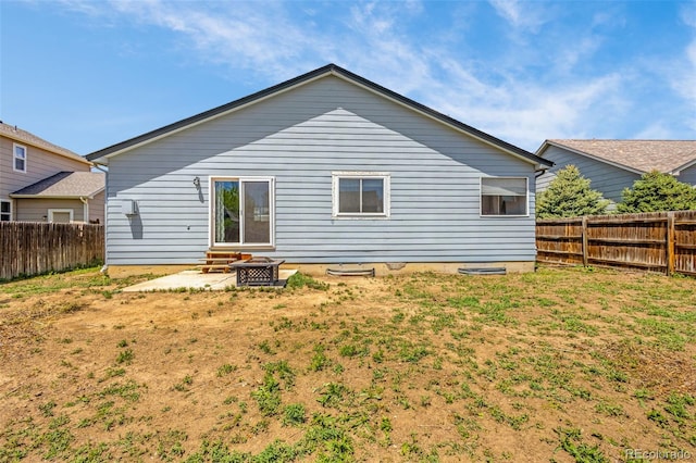 878 Candlestar Loop, Fountain, CO 80817 - rear view of house featuring a fenced backyard