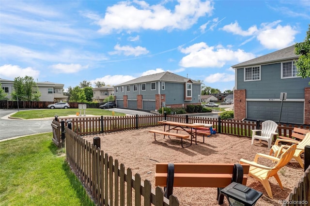 8237 W 54th Ave Unit 2, Arvada, CO 80002 - view of patio / terrace featuring a residential view and a garage