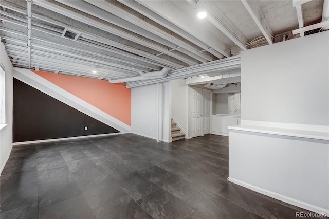 8237 W 54th Ave Unit 2, Arvada, CO 80002 - finished below grade area featuring stairs and baseboards