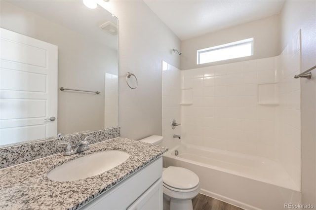 full bath with vanity, toilet, shower / bathtub combination, and wood finished floors