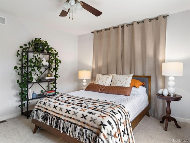 bedroom with ceiling fan and carpet