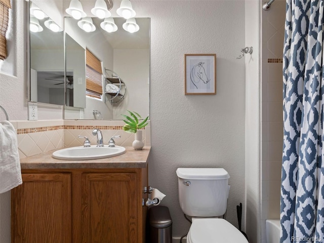 full bathroom with tasteful backsplash, shower / bathtub combination with curtain, vanity, and toilet