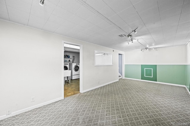 3306 S Logan St, Englewood, CO 80113 - finished below grade area with independent washer and dryer, carpet floors, stairway, and wainscoting