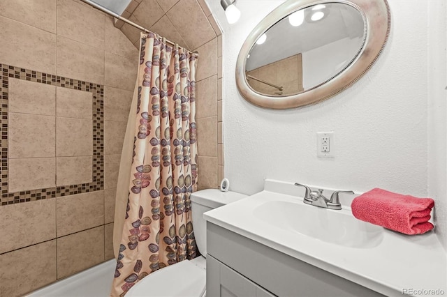 3306 S Logan St, Englewood, CO 80113 - bathroom featuring vanity and shower / bath combo with shower curtain