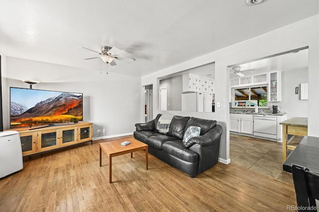 3306 S Logan St, Englewood, CO 80113 - living area featuring ceiling fan and wood finished floors