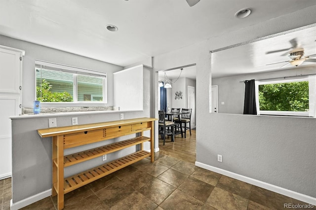 3306 S Logan St, Englewood, CO 80113 - hallway with plenty of natural light and a textured wall