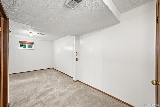 3306 S Logan St, Englewood, CO 80113 - basement featuring carpet floors and a textured ceiling