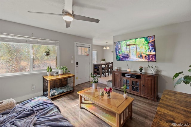 1944 Carmel Dr, Colorado Springs, CO 80910 - living area with wood finished floors and ceiling fan