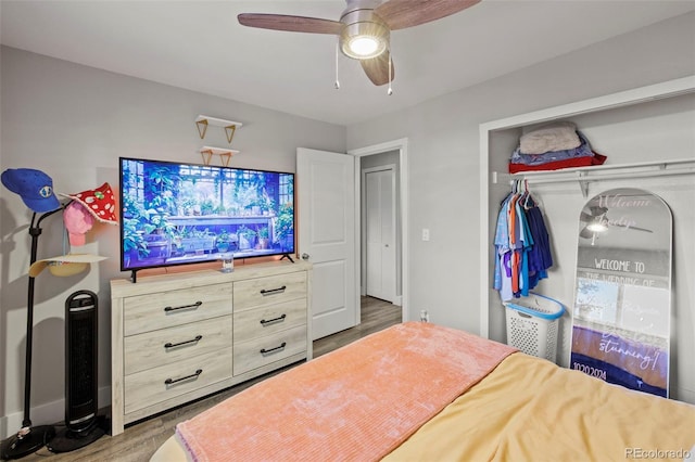 1944 Carmel Dr, Colorado Springs, CO 80910 - bedroom with wood finished floors, a closet, and ceiling fan