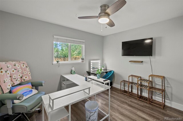 1944 Carmel Dr, Colorado Springs, CO 80910 - home office with wood finished floors and ceiling fan
