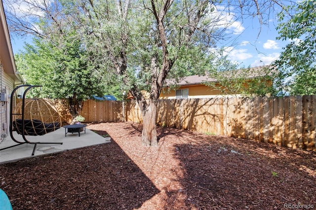 1944 Carmel Dr, Colorado Springs, CO 80910 - fenced backyard featuring a patio