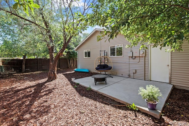 1944 Carmel Dr, Colorado Springs, CO 80910 - rear view of house featuring a patio