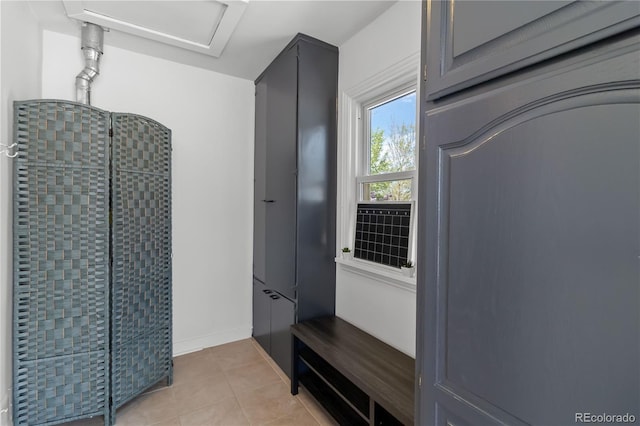 mudroom with light tile patterned floors