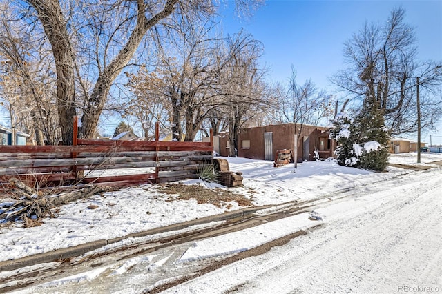 view of yard covered in snow