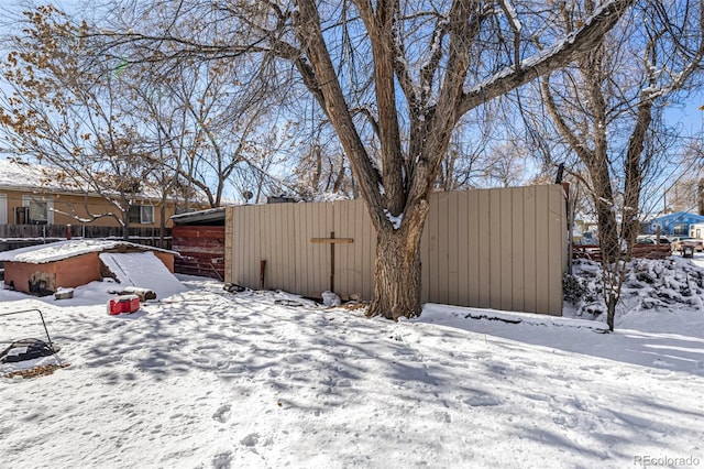 view of yard covered in snow