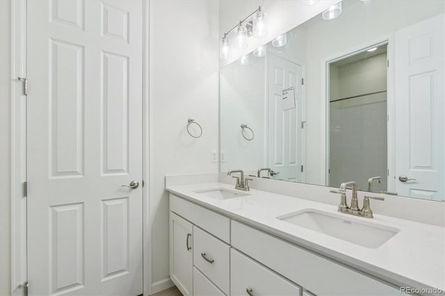 bathroom featuring vanity and walk in shower