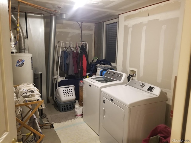 2240 S Pagosa Ct Unit B, Aurora, CO 80013 - laundry area with washing machine and dryer and electric water heater