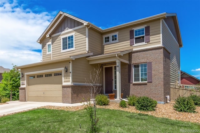 craftsman-style home featuring a garage and a front lawn