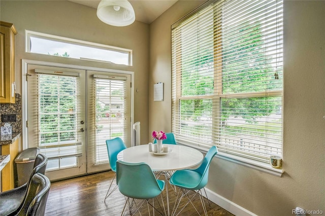 2479 S High St, Denver, CO 80210 - dining space with french doors and dark wood-style flooring