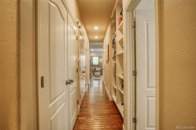 2479 S High St, Denver, CO 80210 - corridor featuring a textured wall, dark wood-style flooring, and recessed lighting