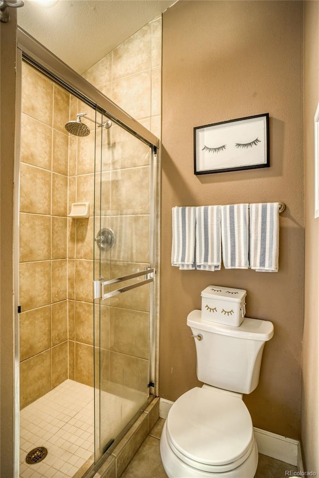 2479 S High St, Denver, CO 80210 - full bathroom with a shower stall and tile patterned flooring