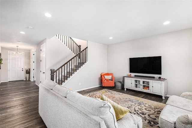 living room featuring dark wood-type flooring