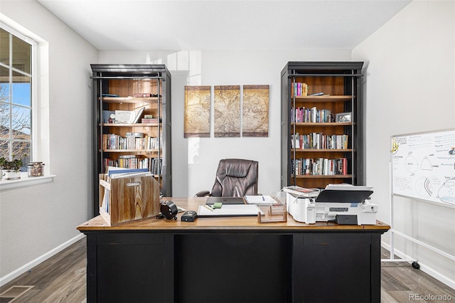 office space with hardwood / wood-style flooring