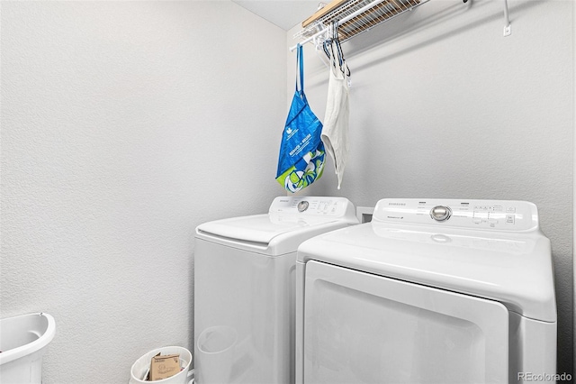 laundry room featuring washer and dryer