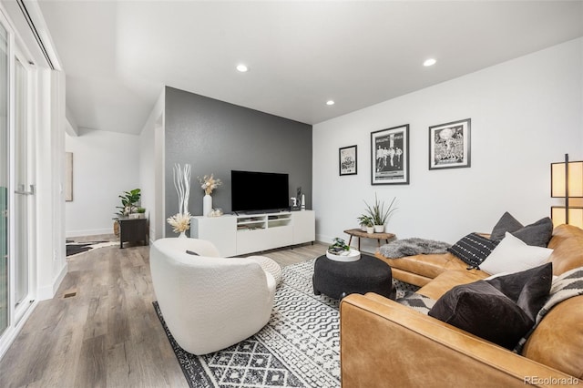 21482 E 60th Ave, Aurora, CO 80019 - living area featuring wood finished floors, baseboards, and recessed lighting
