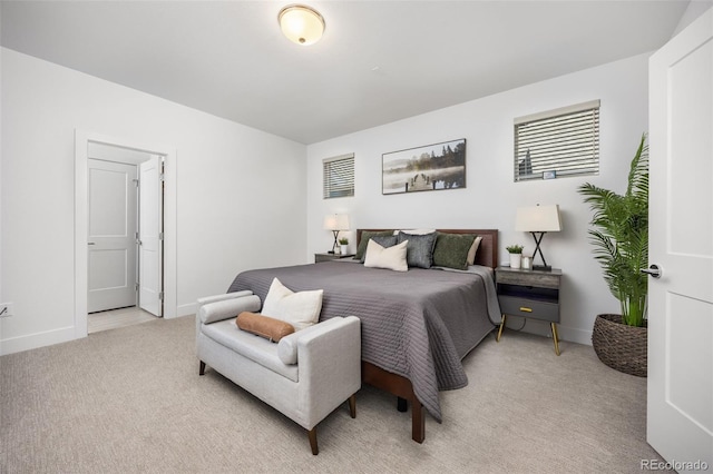 21482 E 60th Ave, Aurora, CO 80019 - bedroom featuring light colored carpet and baseboards