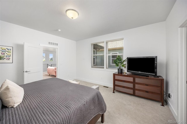 21482 E 60th Ave, Aurora, CO 80019 - bedroom with light colored carpet and baseboards