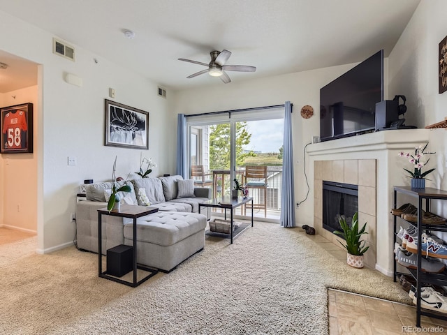 15700 E Jamison Dr Unit 7-203, Englewood, CO 80112 - living area with carpet flooring, ceiling fan, and a tile fireplace