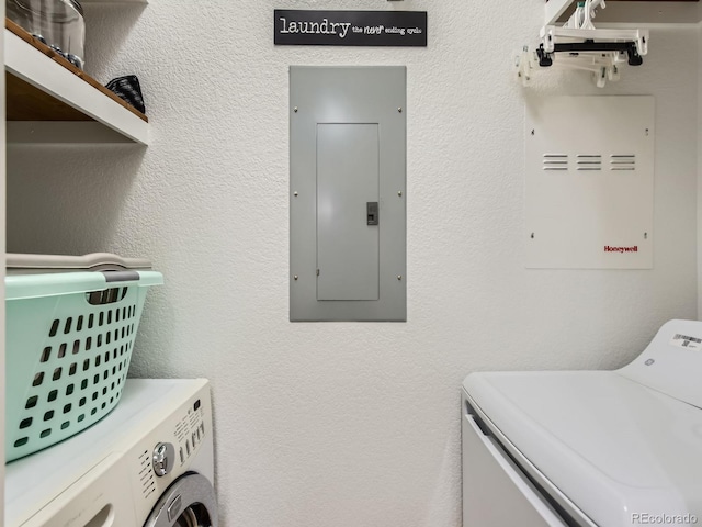 15700 E Jamison Dr Unit 7-203, Englewood, CO 80112 - laundry room featuring washing machine and dryer and electric panel