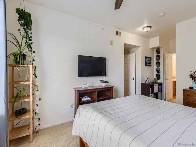 15700 E Jamison Dr Unit 7-203, Englewood, CO 80112 - carpeted bedroom featuring baseboards and connected bathroom
