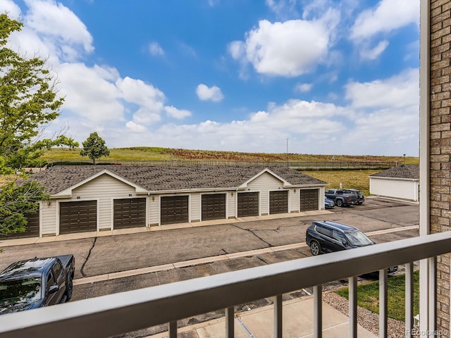 15700 E Jamison Dr Unit 7-203, Englewood, CO 80112 - view of yard with community garages and a balcony