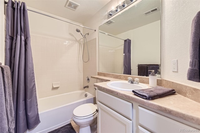 full bath featuring vanity, shower / bath combo, toilet, and visible vents