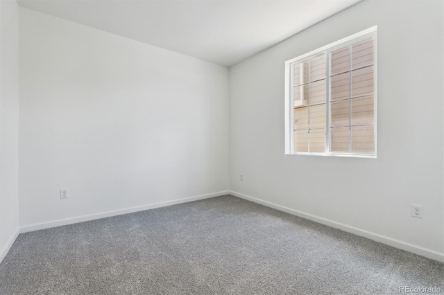 19100 E 96th Pl, Commerce City, CO 80022 - carpeted spare room with baseboards